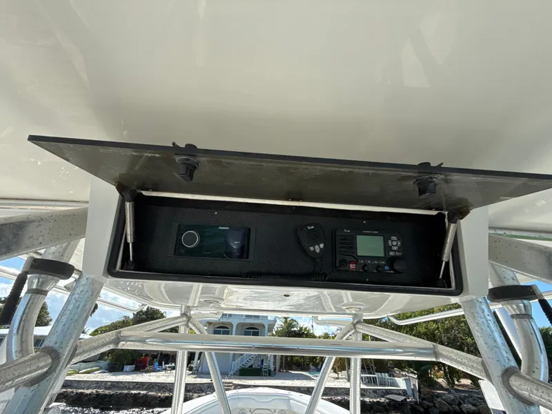 Slide: The Image of 2008 Jupiter 38 boat console with navigation and communication equipment. - 12