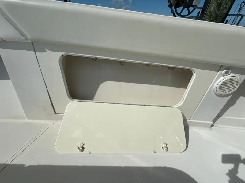 Slide: The Image of Open storage compartment on 2008 Jupiter 38 boat deck. - 21