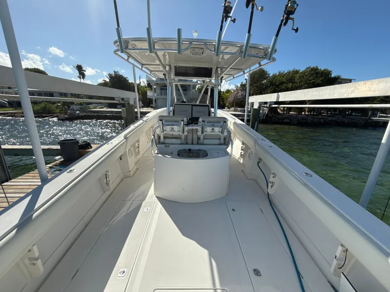 Slide: The Image of 2008 Jupiter 38 boat deck with fishing rods and helm station. - 8