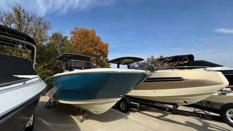 The Image of 2024 Capoforte FX270 boats displayed outdoors on trailers. - 0