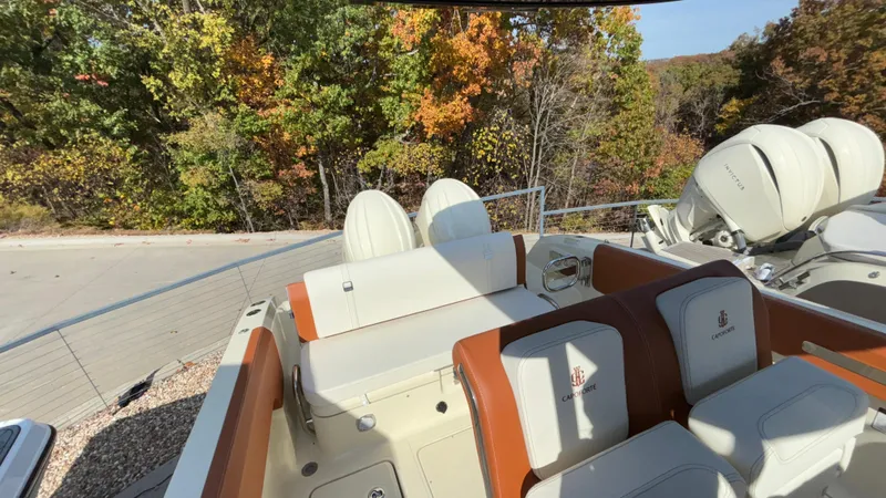 Slide: The Image of 2024 Capoforte FX270 boat interior with autumn foliage background. - 13