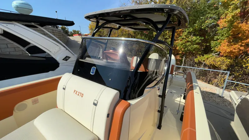 Slide: The Image of 2024 Capoforte FX270 boat with sleek design and modern features. - 28
