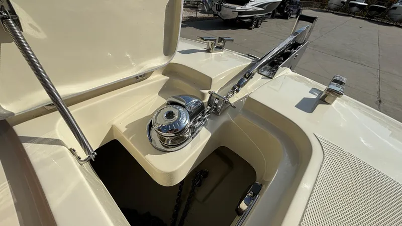 Slide: The Image of 2024 Capoforte FX270 boat anchor compartment with chrome fittings. - 32