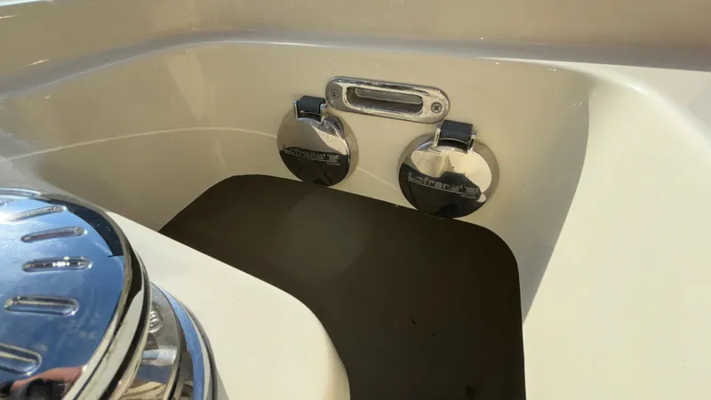 Slide: The Image of 2024 Capoforte FX270 boat deck with chrome fittings and sleek design. - 33