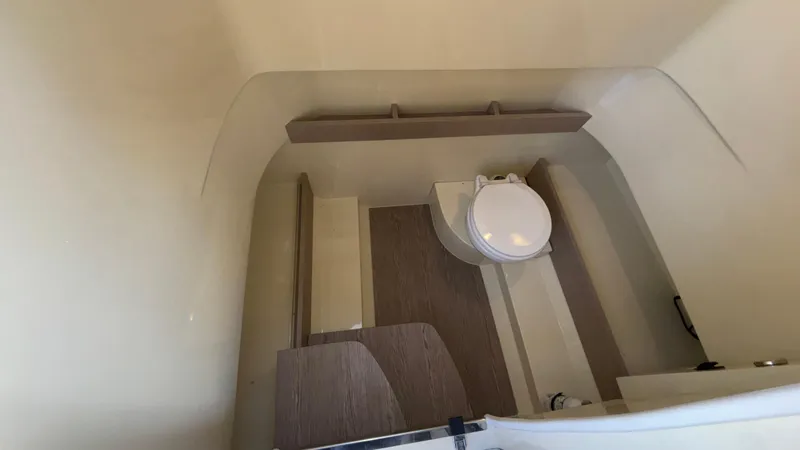 Slide: The Image of 2024 Capoforte FX270 boat interior bathroom with modern design and wooden flooring. - 36