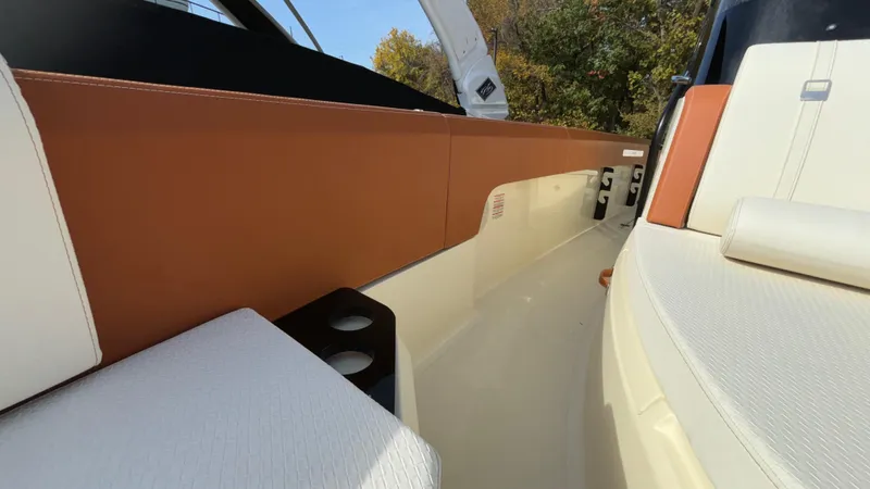 Slide: The Image of 2024 Capoforte FX270 boat interior with sleek seating and modern design. - 42