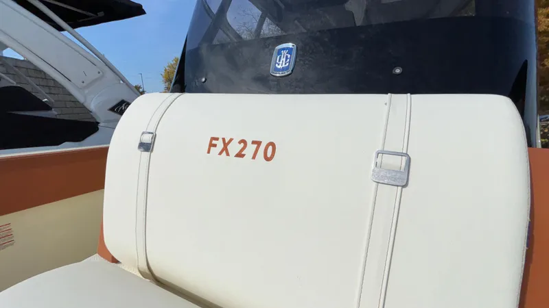 Slide: The Image of 2024 Capoforte FX270 boat seat with logo and windshield. - 43