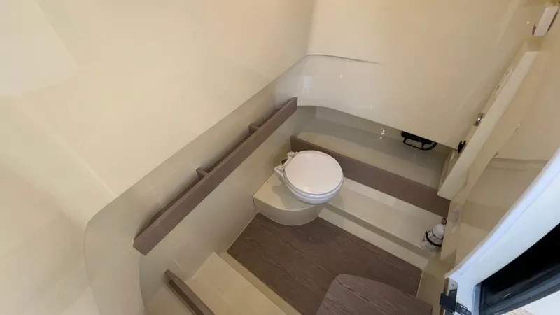 Slide: The Image of 2024 Capoforte FX270 boat interior bathroom with modern design and compact toilet. - 47