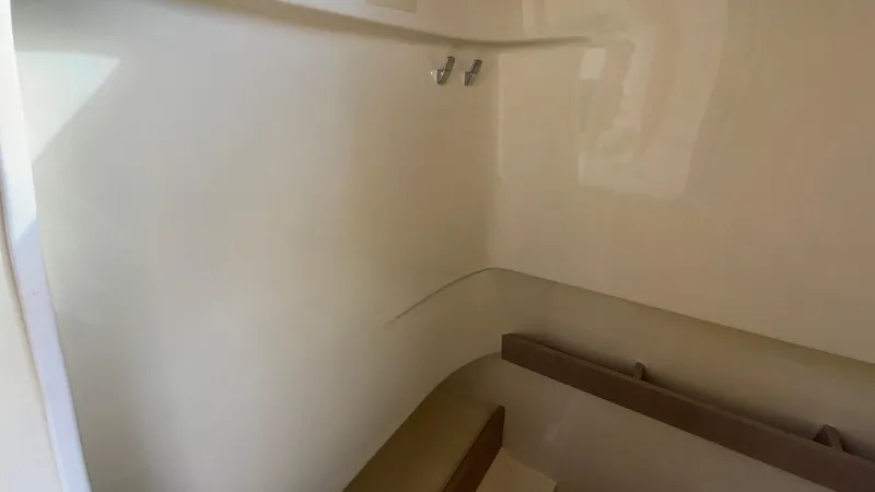 Slide: The Image of Interior of 2024 Capoforte FX270 boat, featuring sleek, minimalist design. - 49