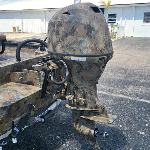 Slide: The Image of Camouflage-patterned 2025 Excel 1860SWV4 Shallow Water F4 Console Series boat motor. - 17