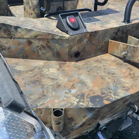 Slide: The Image of 2025 Excel 1860SWV4 Shallow Water F4 Console, camouflage design, close-up view. - 18