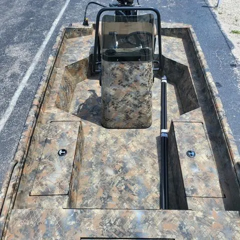 Slide: The Image of 2025 Excel 1860SWV4 Shallow Water F4 Console Series boat with camouflage design. - 7