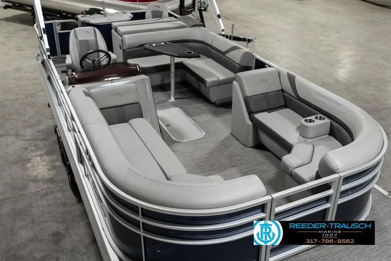 Slide: The Image of 2021 Bennington 22SX pontoon boat with spacious seating and modern design. - 10
