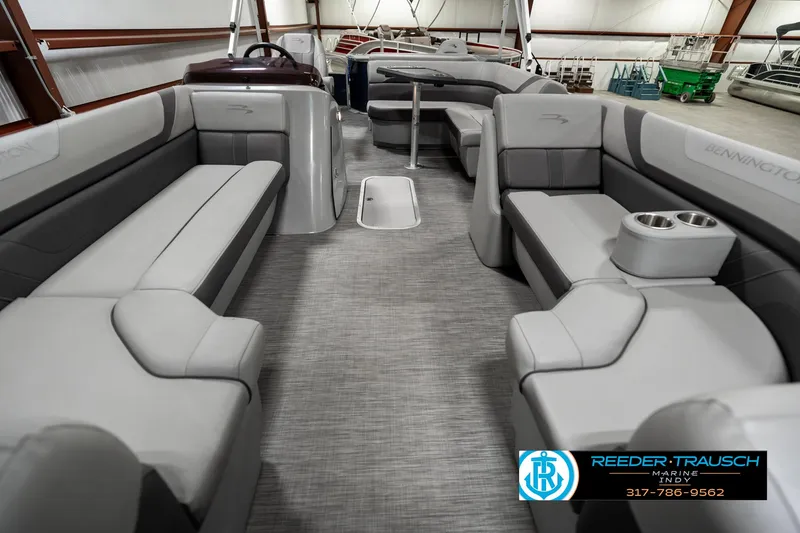 Slide: The Image of 2021 Bennington 22SX pontoon boat interior with gray seating and modern design. - 13