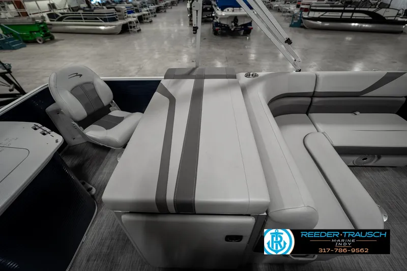 Slide: The Image of 2021 Bennington 22SX pontoon boat interior with gray seating and modern design. - 27