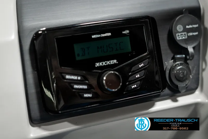 Slide: The Image of Kicker media center on 2021 Bennington 22SX boat dashboard. - 41