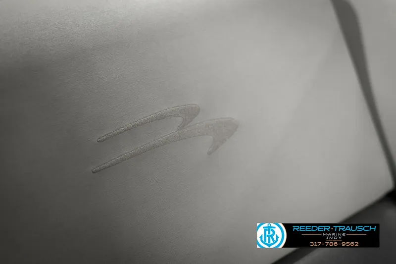 Slide: The Image of Bennington 22SX 2021 boat interior with logo detail. - 46