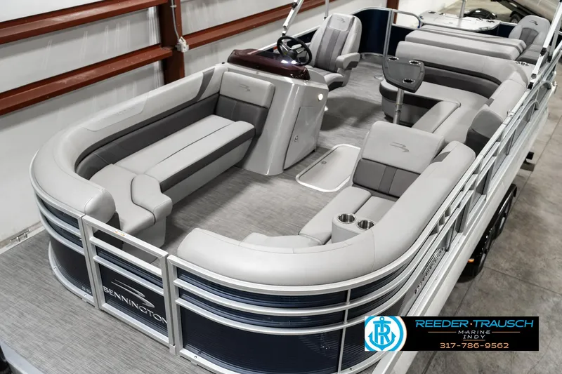 Slide: The Image of 2021 Bennington 22SX pontoon boat with spacious seating and modern design. - 9