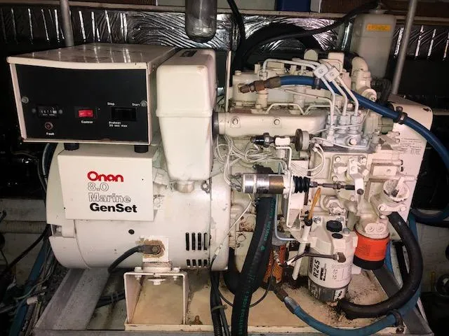 Slide: The Image of Onan 8.0 Marine GenSet in 1990 Trojan 40 Sport Fisherman 3208 Cat Diesel. - 17