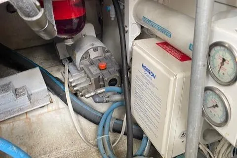 Slide: The Image of Engine room of 1990 Trojan 40 Sport Fisherman with Cat Diesel components and gauges. - 21