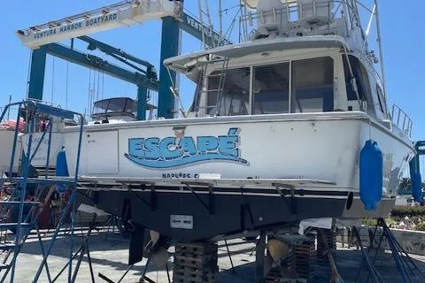 Slide: The Image of 1990 Trojan 40 Sport Fisherman boat in dry dock at Ventura Harbor Boatyard. - 22