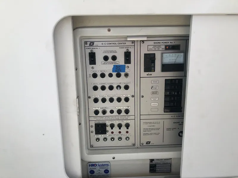 Slide: The Image of Control panel of a 1990 Trojan 40 Sport Fisherman 3208 Cat Diesel boat. - 26