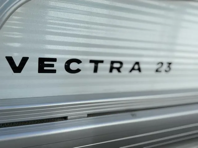 Slide: The Image of 2025 Princecraft VECTRA 23 XT/150 XL pontoon boat, top view, spacious seating layout. - 2