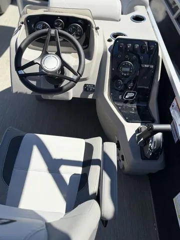 Slide: The Image of 2025 Princecraft VECTRA 23 XT/150 XL pontoon boat with seating and outboard motor. - 6