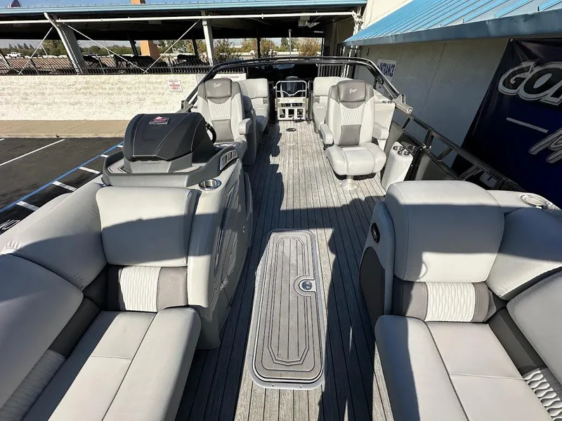 Slide: The Image of 2020 Ranger 2300LS boat interior with gray seating and modern design. - 17