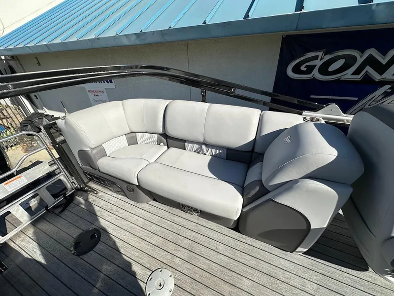 Slide: The Image of 2020 Ranger 2300LS boat with gray cushioned seating on deck. - 23