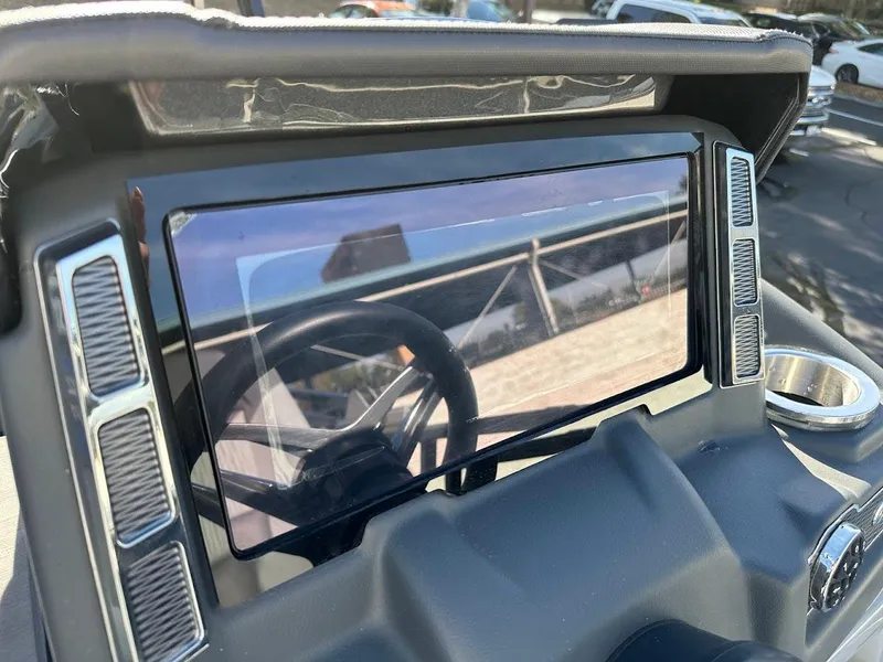 Slide: The Image of Dashboard of 2020 Ranger 2300LS boat with steering wheel reflection. - 29