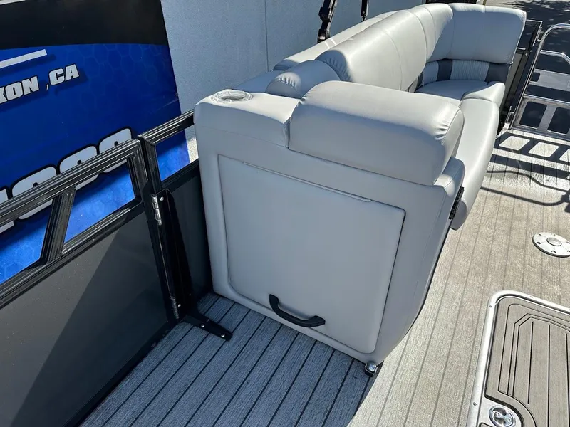 Slide: The Image of 2020 Ranger 2300LS boat with gray seating and deck flooring. - 37