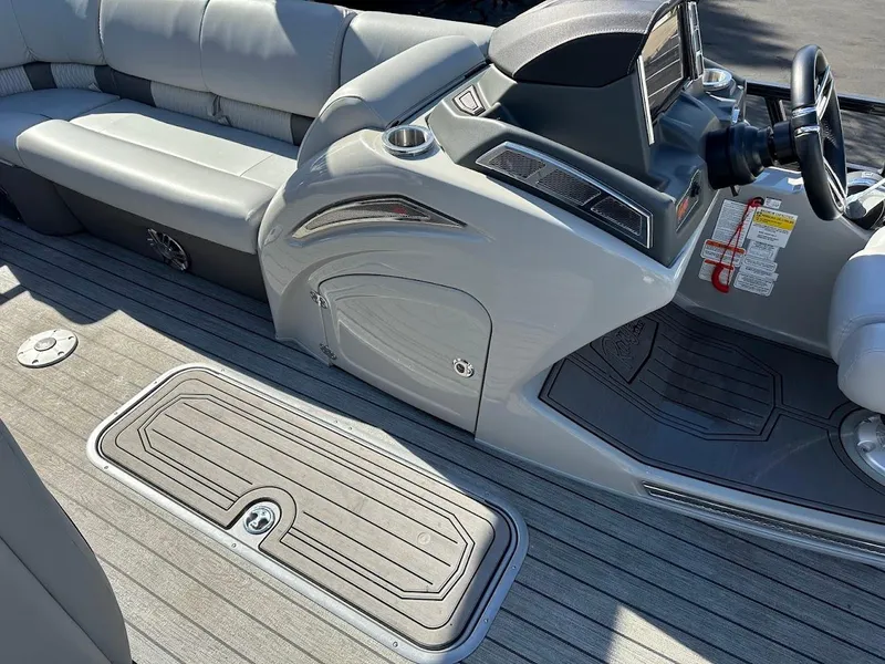 Slide: The Image of 2020 Ranger 2300LS boat interior with sleek seating and modern dashboard. - 39