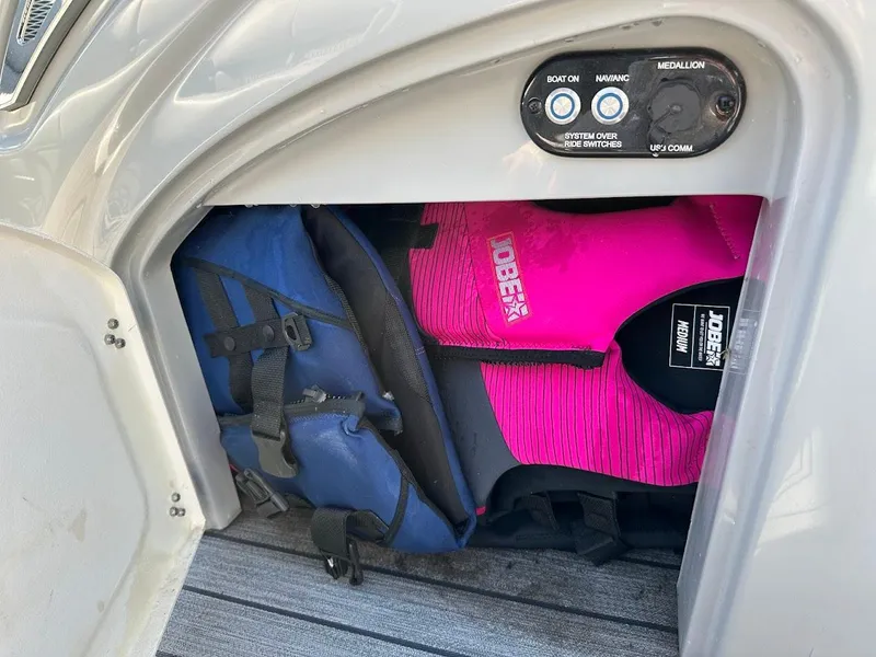 Slide: The Image of Storage compartment in 2020 Ranger 2300LS boat with life jackets. - 40