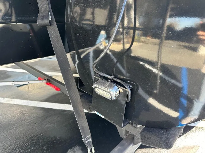 Slide: The Image of Close-up of a 2020 Ranger 2300LS boat trailer hitch and wiring. - 45
