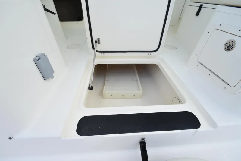 Slide: The Image of Open storage compartment on 2008 World Cat 32 EC boat deck. - 11