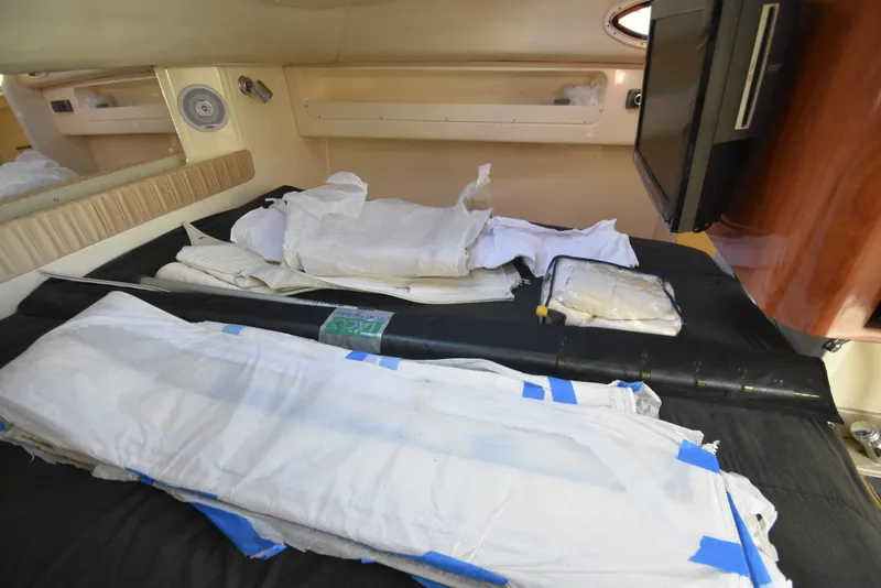Slide: The Image of Interior of 2008 World Cat 32 EC boat with stored equipment and supplies. - 21