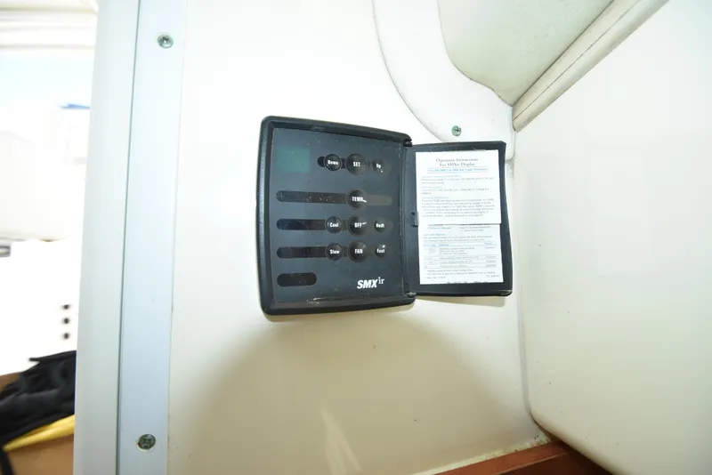Slide: The Image of Control panel on a 2008 World Cat 32 EC boat interior. - 25