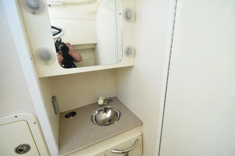 Slide: The Image of 2008 World Cat 32 EC boat bathroom with sink and mirror. - 35