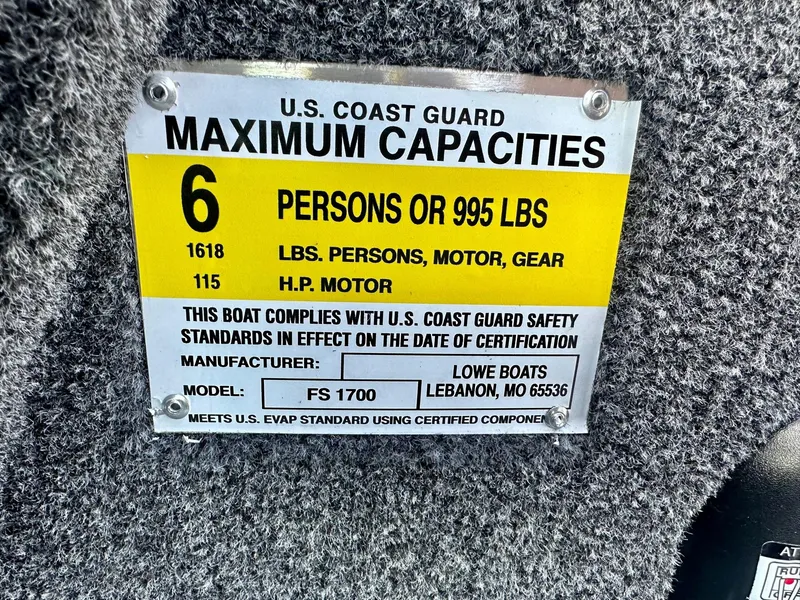 Slide: The Image of U.S. Coast Guard capacity label for 2025 Lowe FS1700 boat, 6 persons or 995 lbs. - 12