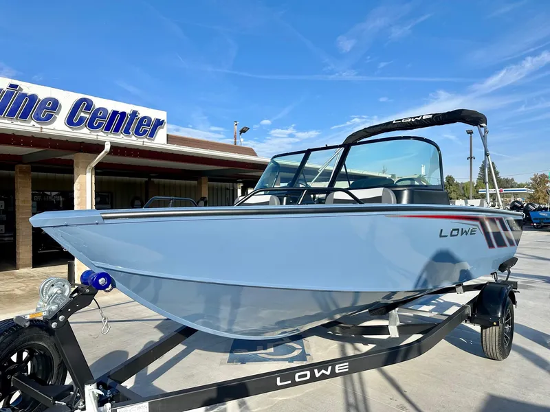 Slide: The Image of 2025 Lowe FS1700 boat with 115HP Mercury engine on trailer at Marine Center. - 8