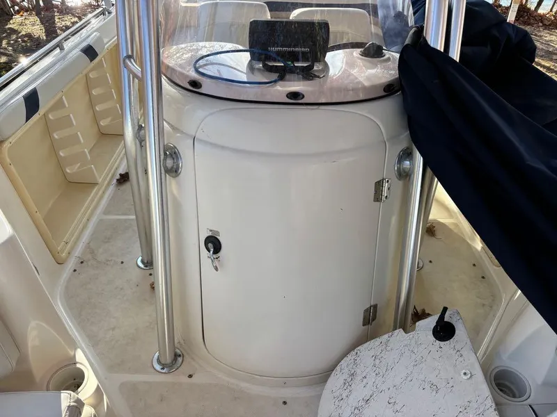 Slide: The Image of 2007 Hurricane Fun Deck GS 231 boat interior with console and seating area. - 15