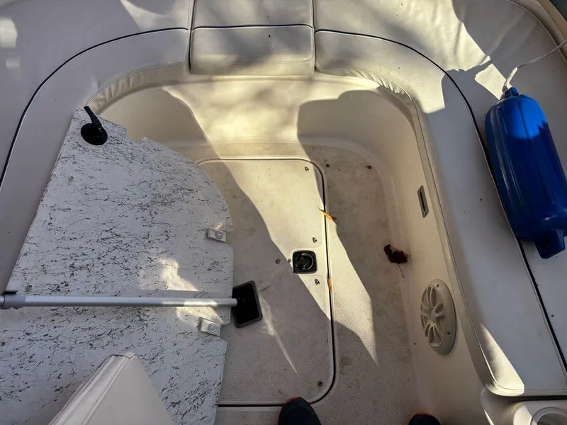 Slide: The Image of 2007 Hurricane Fun Deck GS 231 boat interior with seating and storage area. - 16