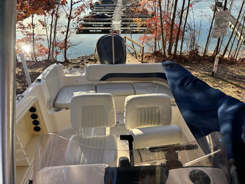 Slide: The Image of 2007 Hurricane Fun Deck GS 231 boat interior at lakeside dock in autumn. - 18