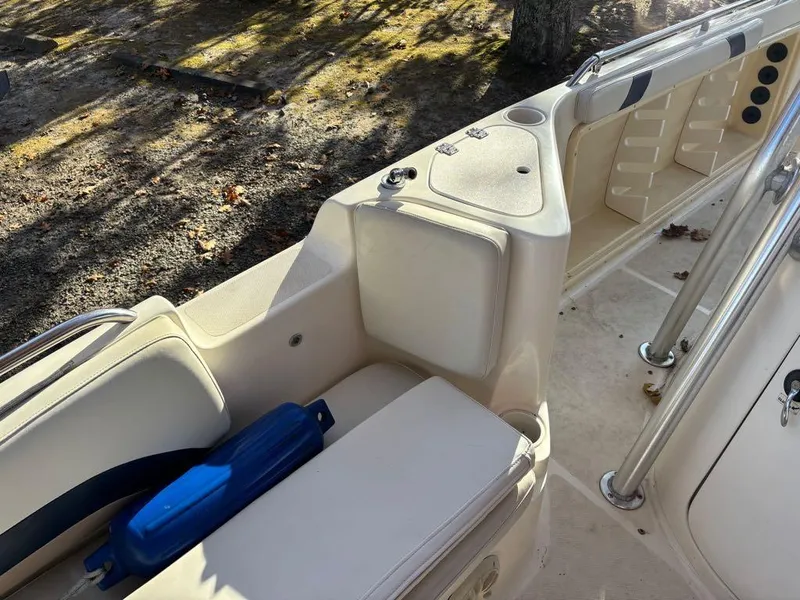 Slide: The Image of 2007 Hurricane Fun Deck GS 231 boat interior with seating and storage compartments. - 9