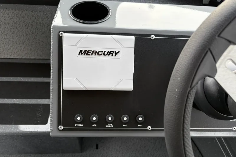 Slide: The Image of Dashboard of 2024 Spartan 26 Maximus Pro XL with Mercury controls and switches. - 22