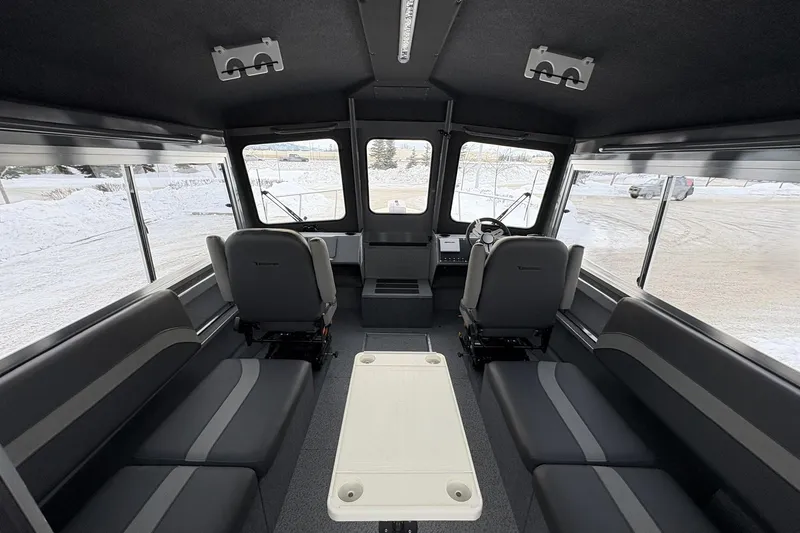 Slide: The Image of Interior of 2024 Spartan 26 Maximus Pro XL, featuring spacious seating and modern design. - 31