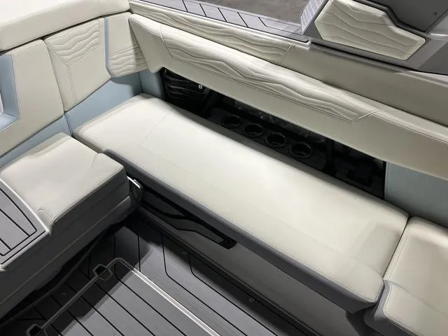 Slide: The Image of Interior seating of 2025 Nautique Super Air Nautique G25 boat, featuring sleek design and premium materials. - 13