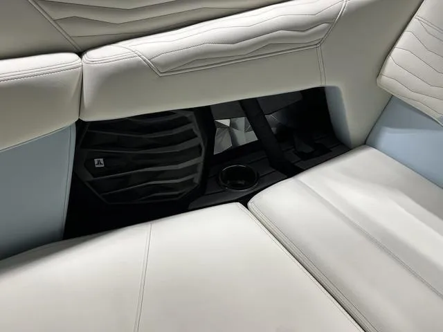 Slide: The Image of Interior seating of 2025 Nautique Super Air Nautique G25 boat, featuring premium upholstery. - 21