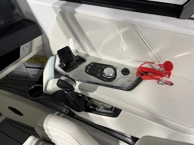 Slide: The Image of 2025 Nautique Super Air Nautique G25 control panel with sleek design and modern features. - 26